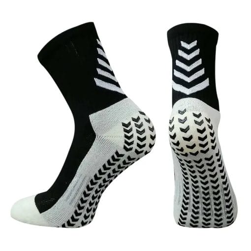Et par sorte og hvite Grip-sokker - sortert med piler på.